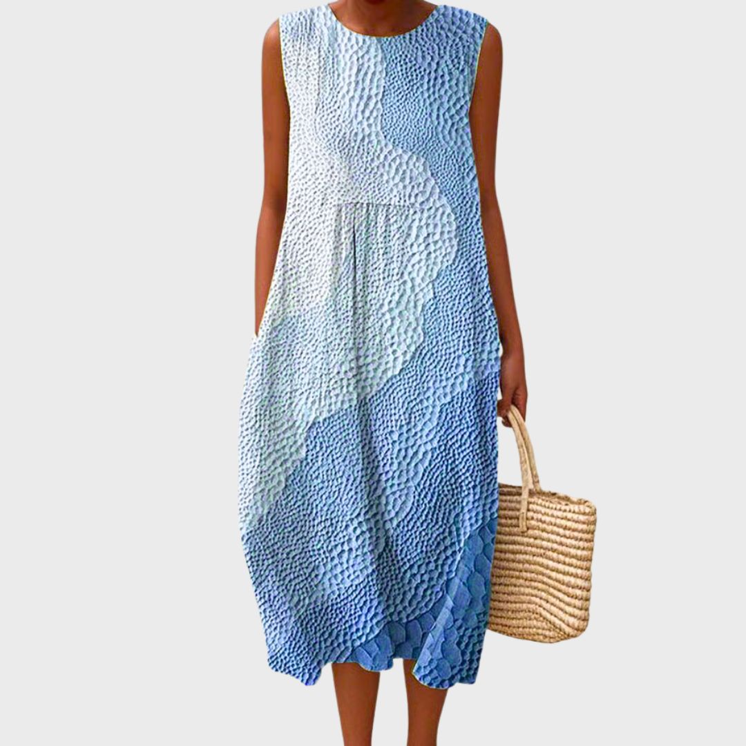 Casual yet elegant women's knee-length dress, offering comfortable everyday style for spring and summer.