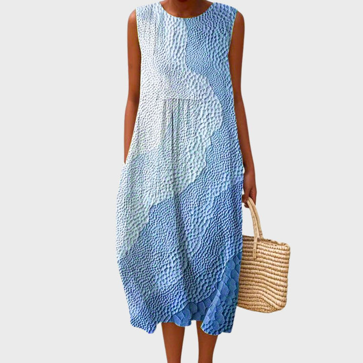 Casual yet elegant women's knee-length dress, offering comfortable everyday style for spring and summer.