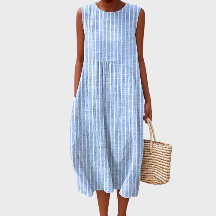 Soft, comfortable women's knee-length dress, an elegant and modest option for everyday spring/summer style.