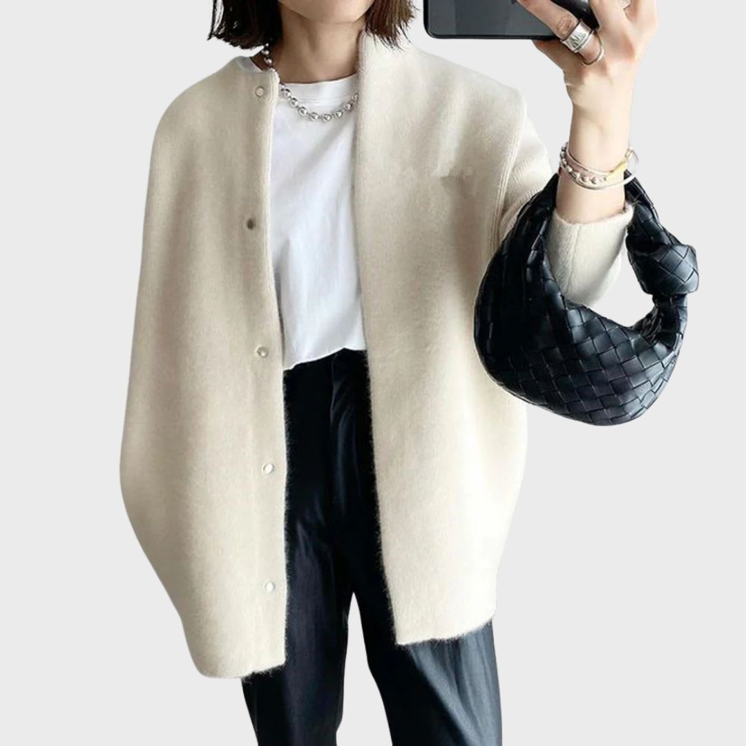 Sophisticated women's knit cardigan, a timeless and elegant layering piece for everyday comfort and style.