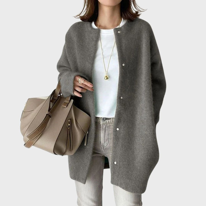 Chic women's knitwear cardigan, an elegant and versatile layering sweater for timeless everyday fashion.
