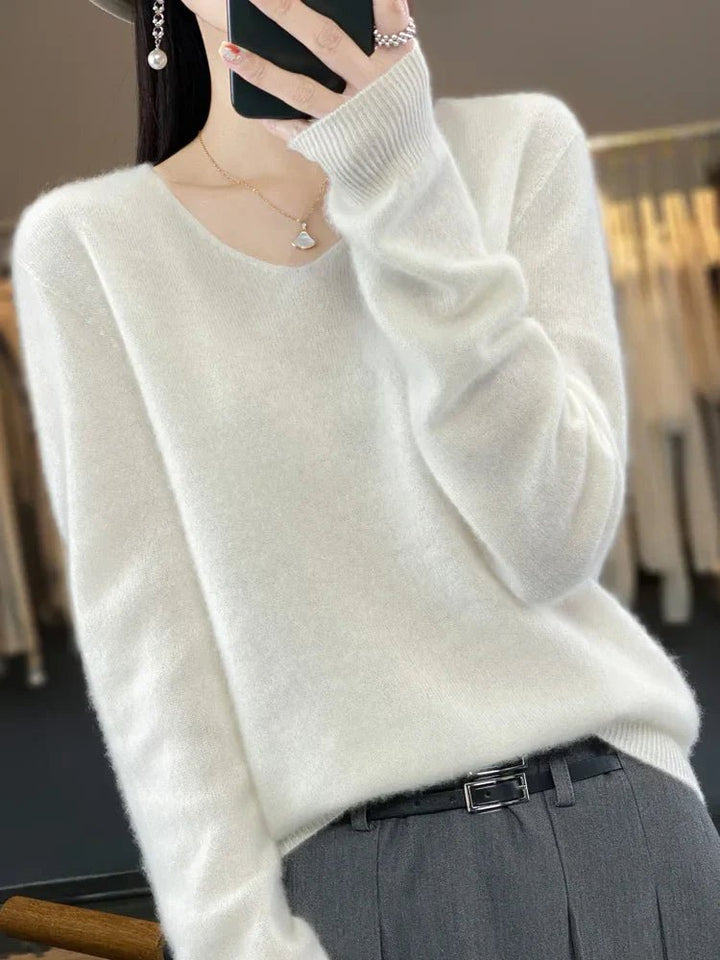 Women's long sleeve knit pullover, an elegant and cozy top for winter style.