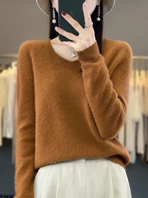 Cozy and elegant women's knit pullover, a versatile top for winter fashion.