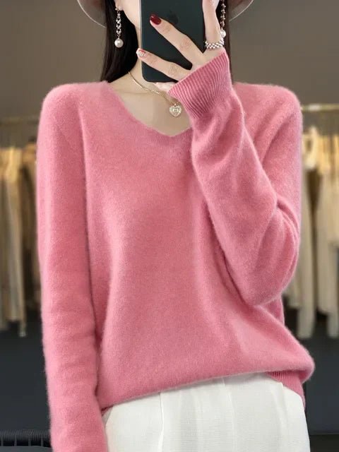 Effortless women's long sleeve knit top, perfect for casual elegant winter wear.