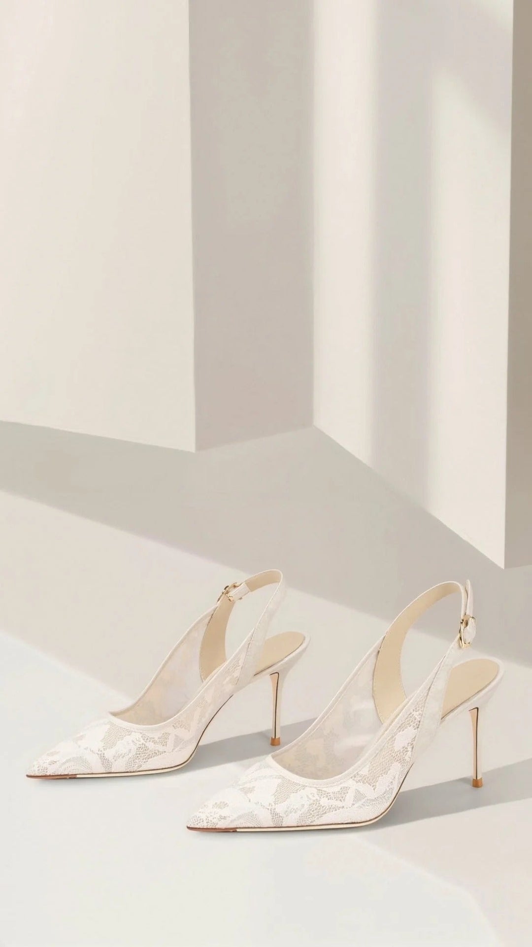 Fashionable women's heels featuring intricate lace design, elegant pointed toe & slingback style.