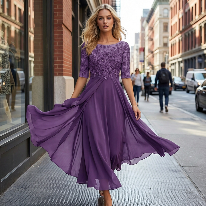 Formal party midi dress for women, with exquisite lace detail, round neck, and elegant flowing skirt.