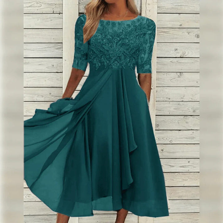Classic women's formal midi dress, elegant lace design, three-quarter sleeves, and a comfortable flowing fit.