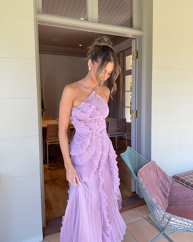 Women's elegant lavender halter maxi dress with cascading ruffles, a beautiful choice for special occasion wear.