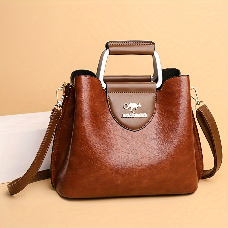 Stylish brown leather women's everyday shoulder handbag, a versatile accessory for chic looks.