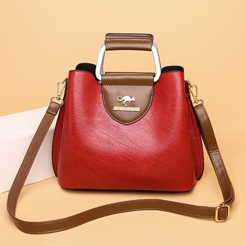 Vibrant red leather women's shoulder bag, an elegant and stylish handbag for versatile everyday wear.