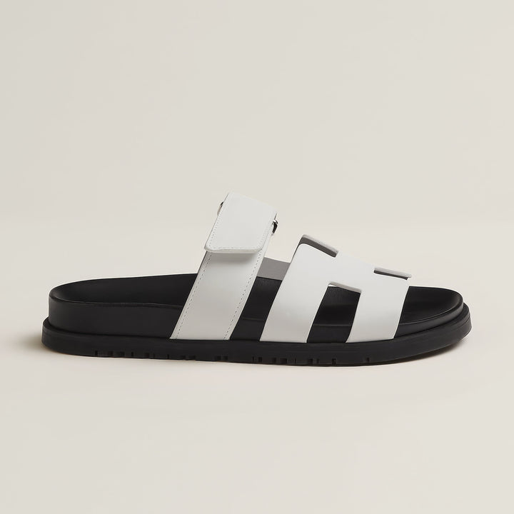Elegant flat sandals for women, comfortable adjustable straps, summer-ready versatile style.
