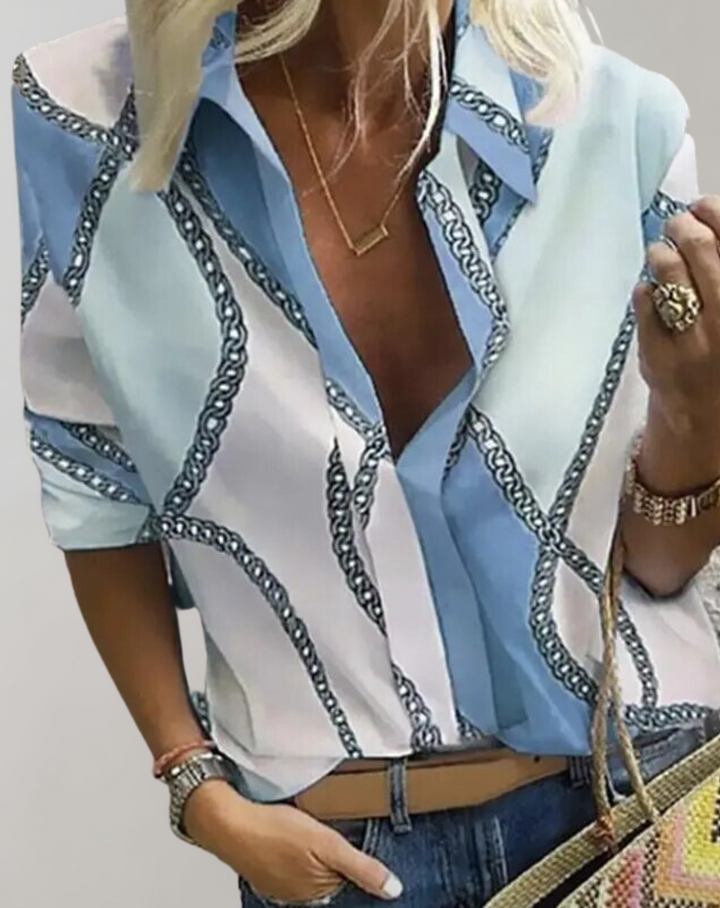 Detailed chain print blouse for women. Elegant long sleeve top suitable for office, casual, or stylish outings.