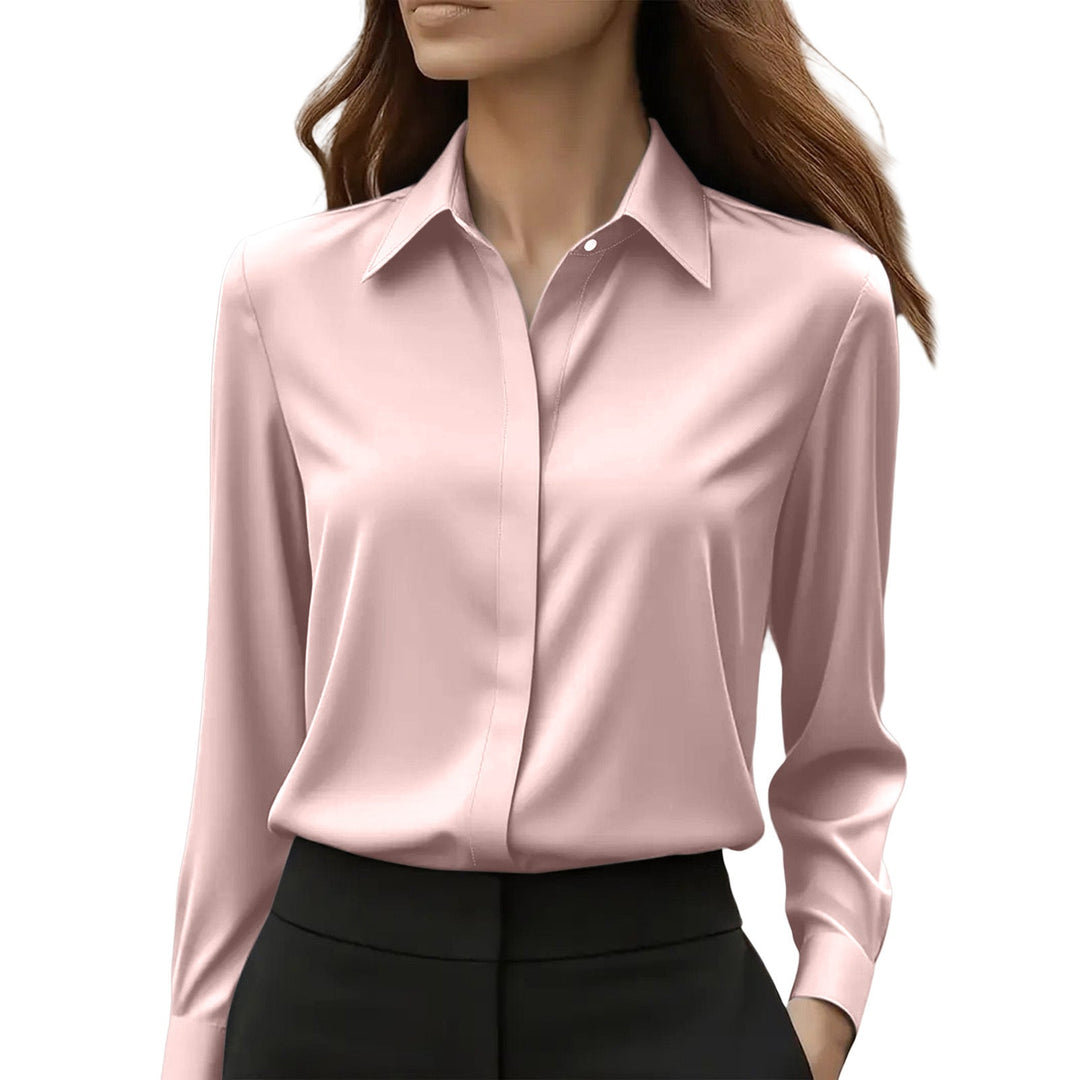 Women's elegant button-up blouse, a classic long sleeve top for versatile workwear.