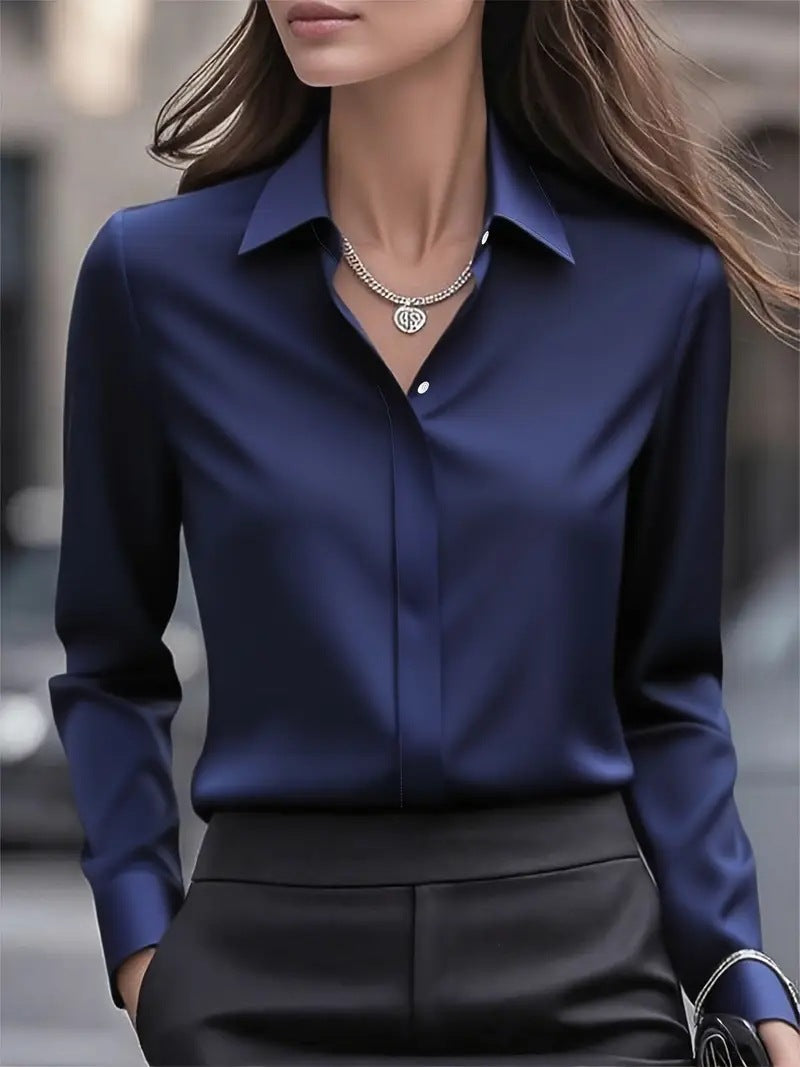 Elegant white long sleeve women's blouse, a timeless button-up top for versatile style.
