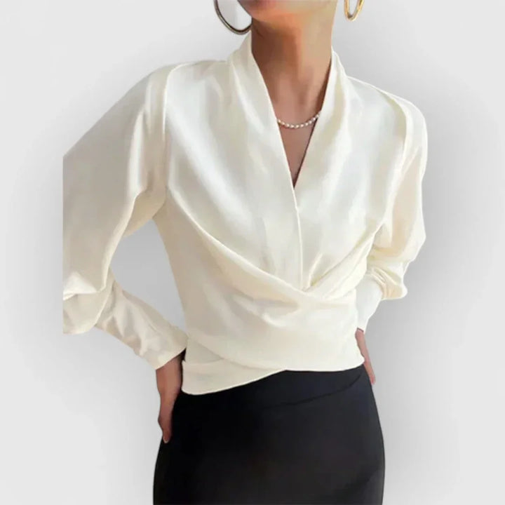 Versatile women's fashion blouse, a chic long-sleeve wrap top suitable for professional office or casual wear.