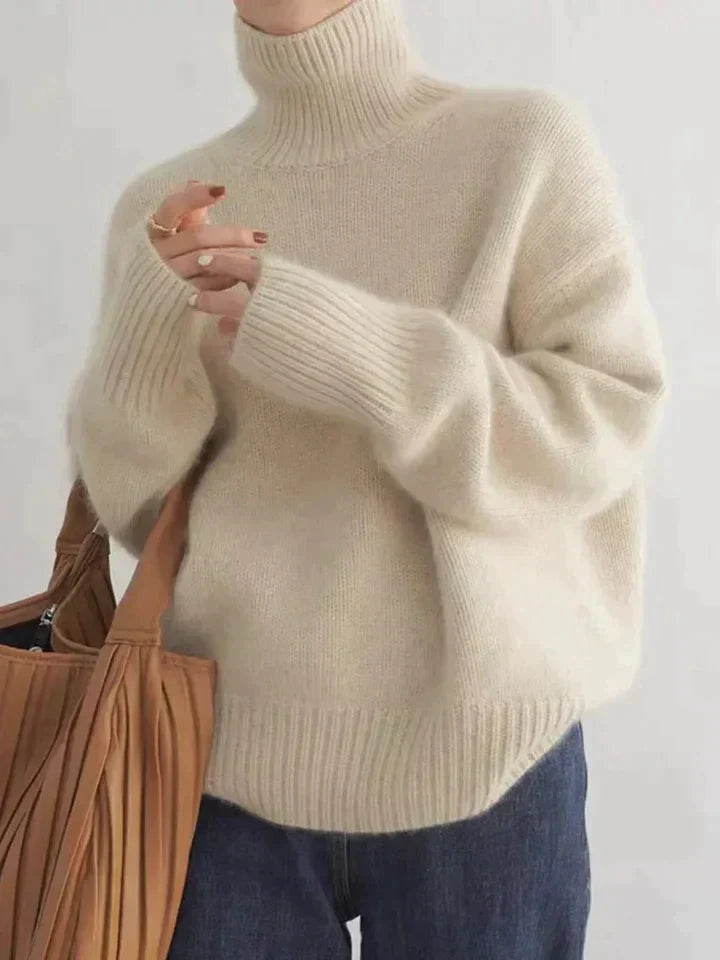 Sophisticated women's turtleneck sweater, a warm and elegant top made from a premium luxe knit.