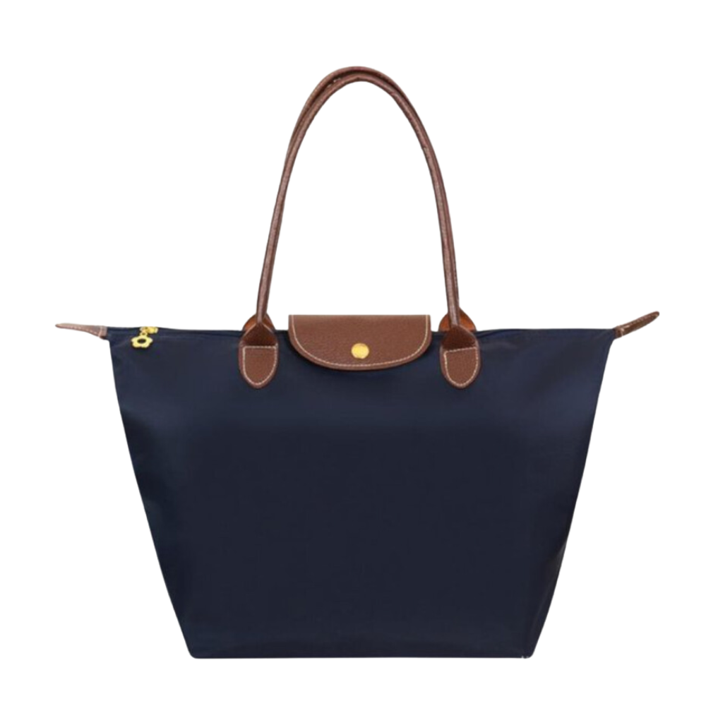 Chic women's shoulder tote bag. Luxurious design with secure zip closure & comfortable straps. A daily essential.