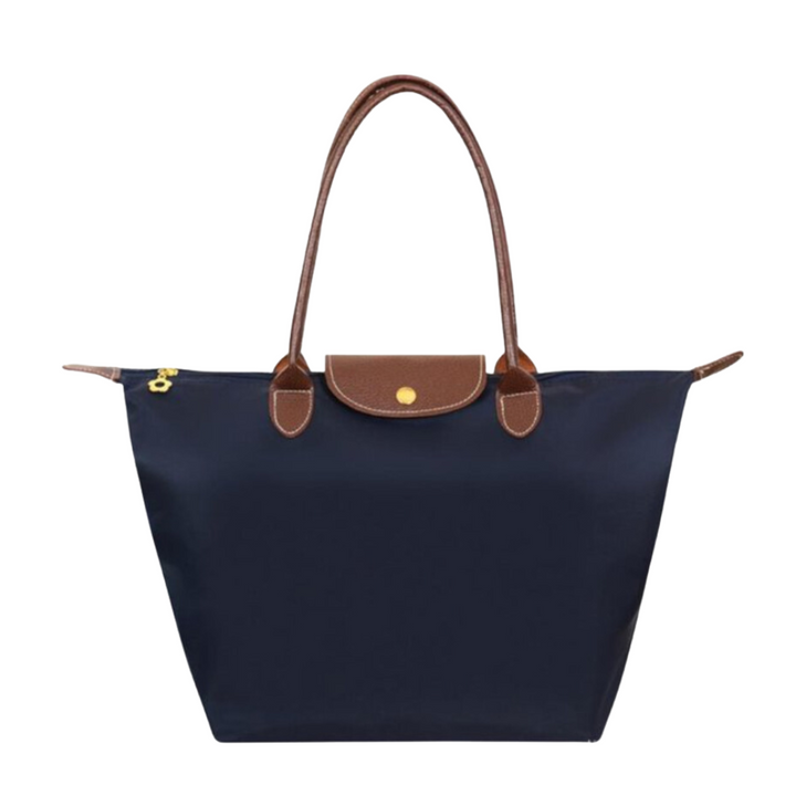 Chic women's shoulder tote bag. Luxurious design with secure zip closure & comfortable straps. A daily essential.