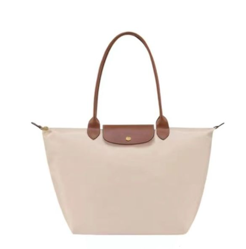 Fashionable women's luxury tote bag. Spacious interior, secure zipper, and elegant style for any occasion.