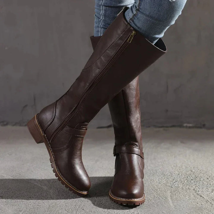 Chic mid-calf boots for women, versatile for dressy or casual wear. Fashionable and comfortable.