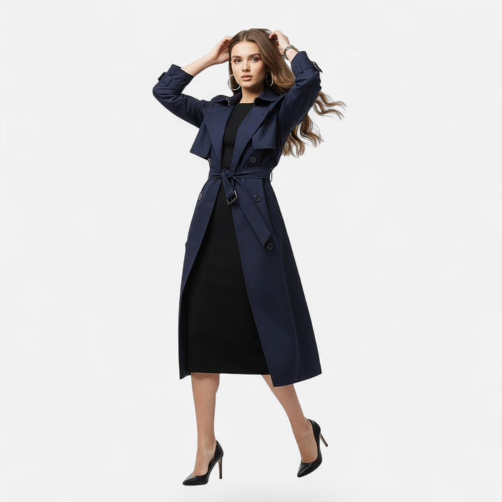 Sophisticated mid-length trench coat for women. Classic design includes a stylish tie-waist.