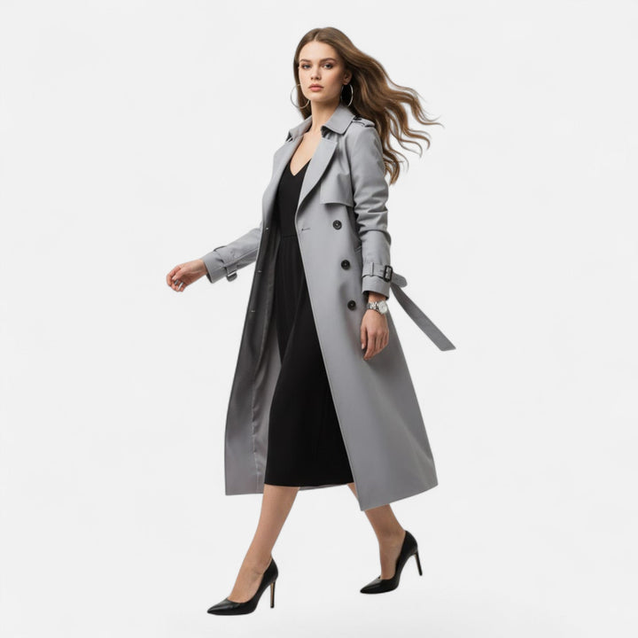 Classic women's mid-length trench coat, featuring a chic tie-waist. Essential sophisticated outerwear.