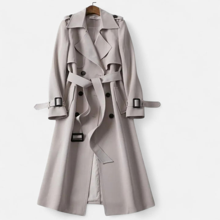 Fashionable women's mid-length elegant trench coat. Features a tie-waist for a flattering silhouette.