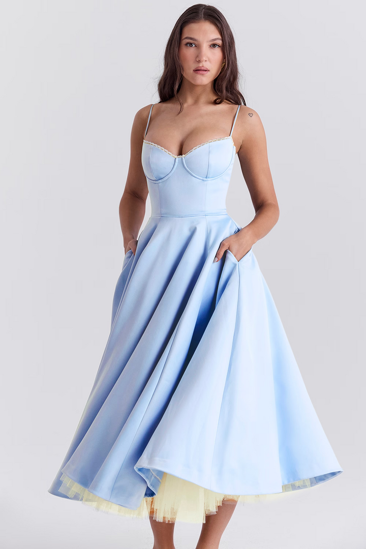 Elegant women's midi bridesmaid dress featuring a corset bodice & practical pockets.