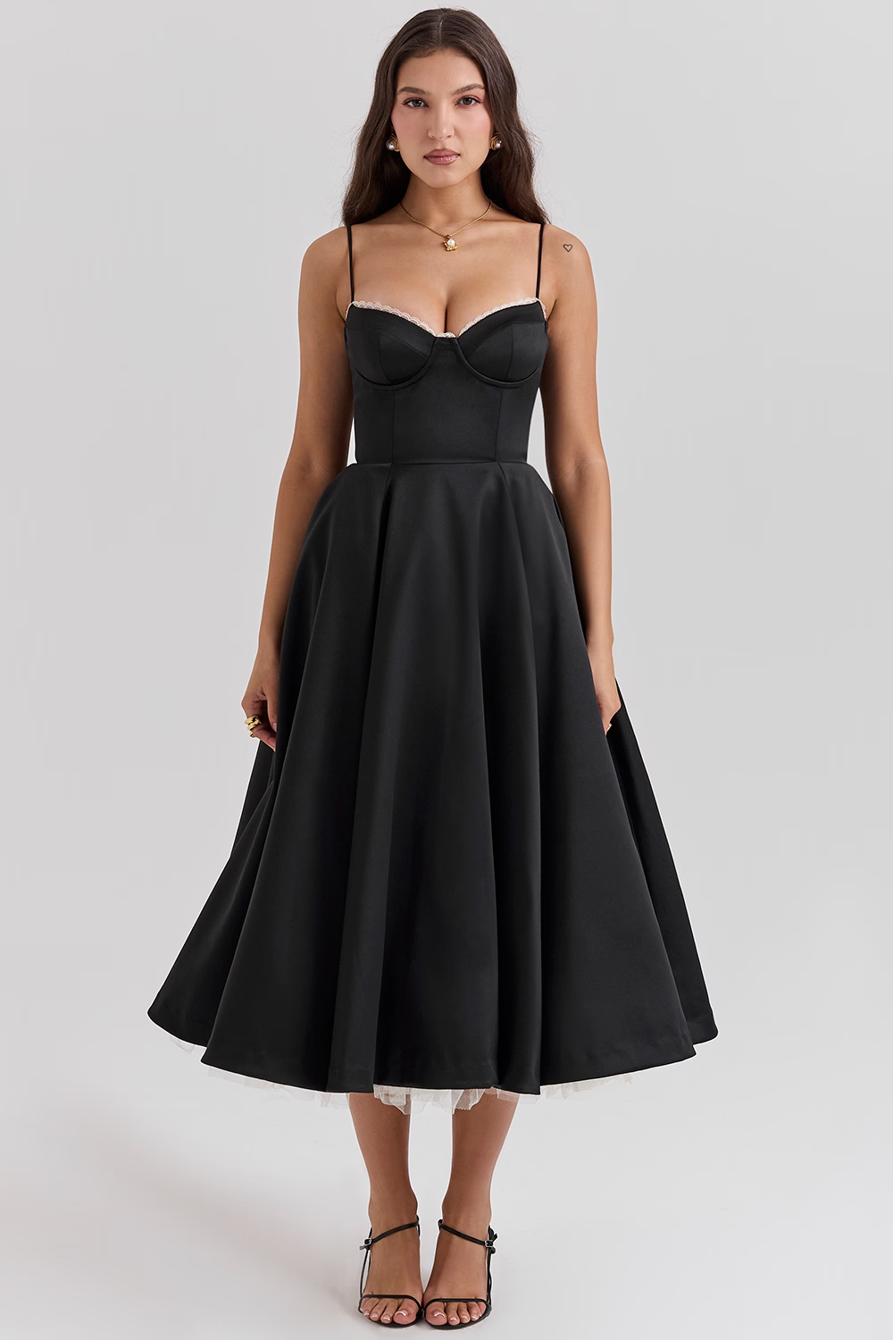 Chic women's midi party dress with a stylish corset bodice, practical pockets, and elegance.