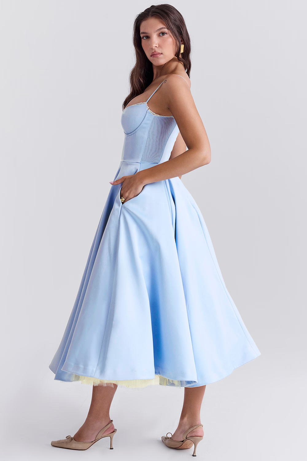Stunning formal midi dress for bridesmaids, with elegant corset and handy side pockets.