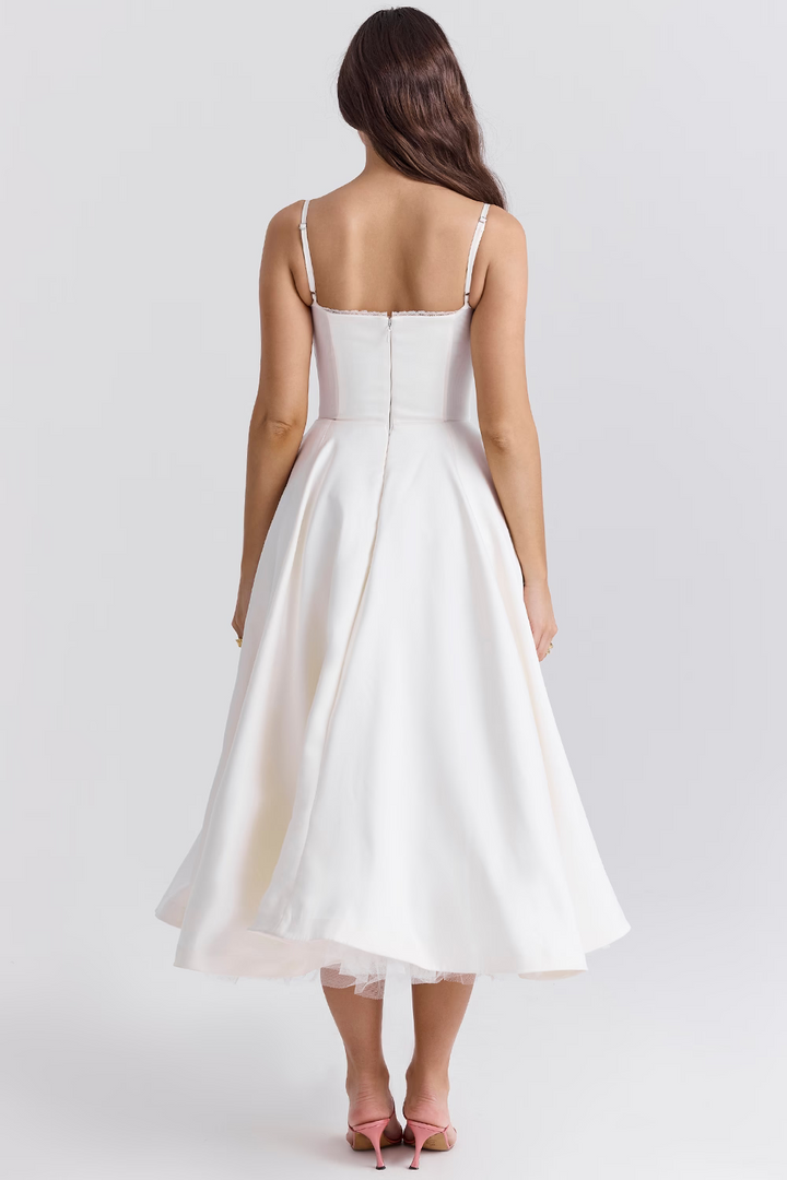 Formal women's party dress: midi length, sophisticated corset bodice, and functional pockets.