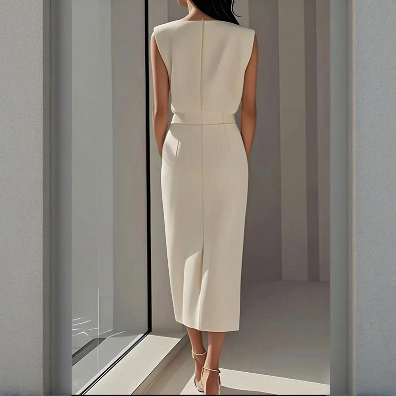 Chic women's midi dress featuring stylish side button detail, a flattering tailored fit, and a modern split hem.