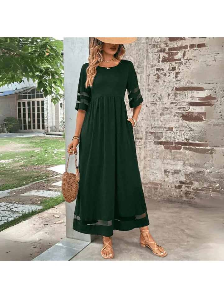 Sophisticated women's midi cocktail dress, flattering with tummy coverage for elegant events.