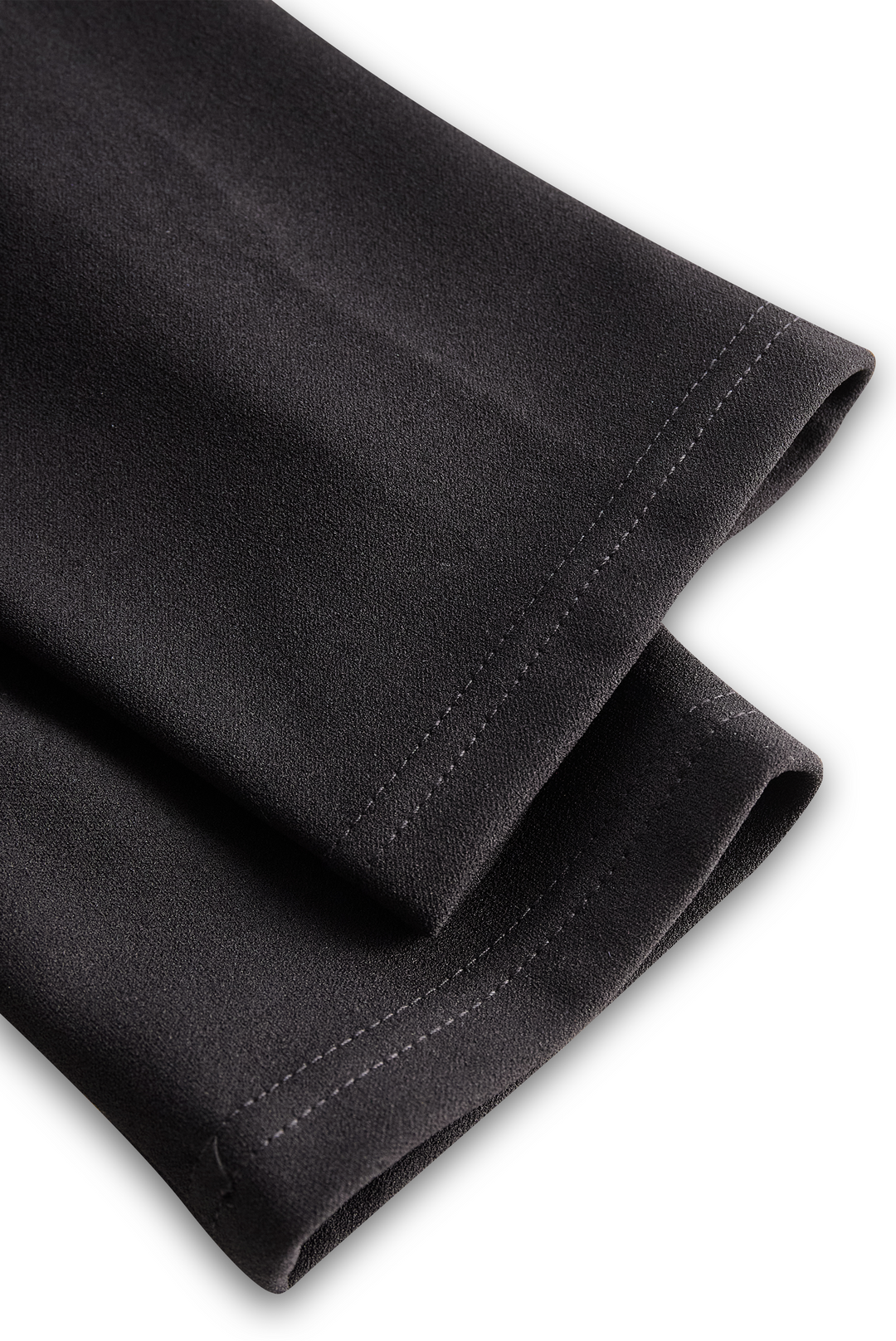 Texture detail of the fabric for a women's elegant midi graduation dress with a mandarin collar.