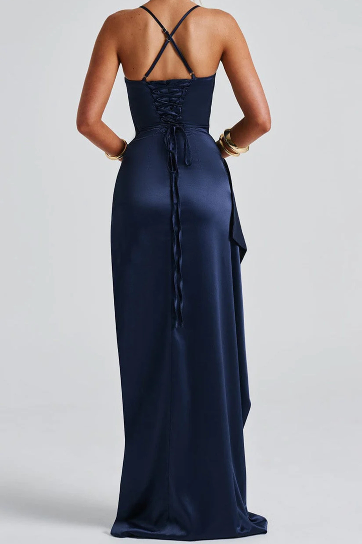 Stunning navy blue women's spaghetti strap maxi dress, elegantly ruched with a high slit, perfect for formal events.