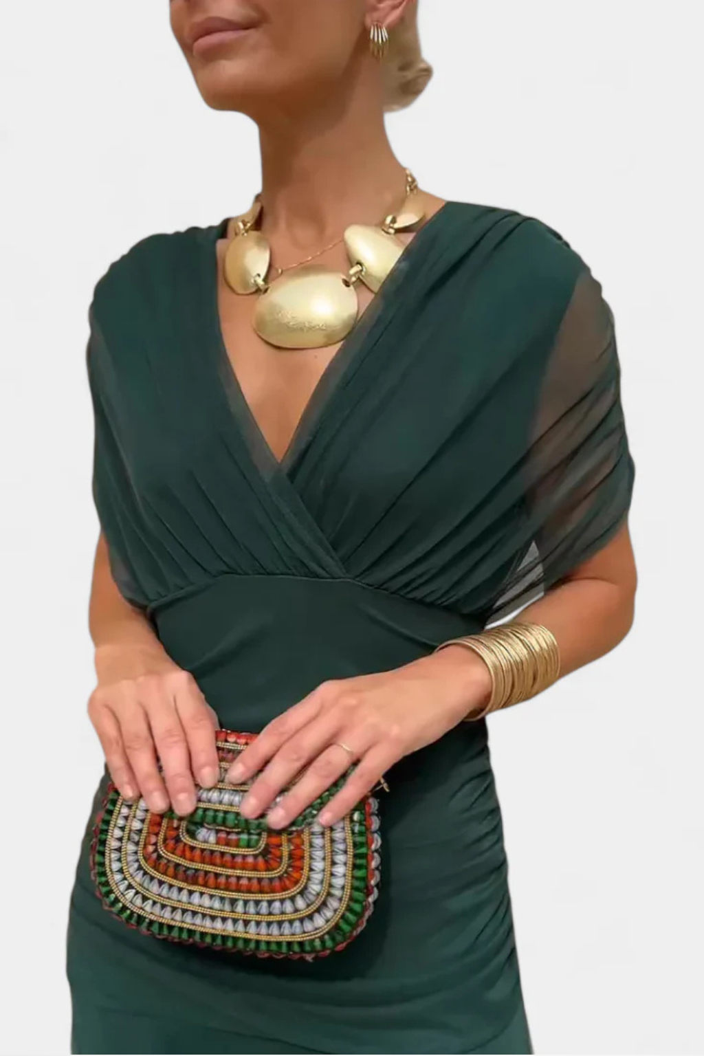 Stylish women's off-shoulder midi dress, featuring elegant pleats, great for summer events & parties.
