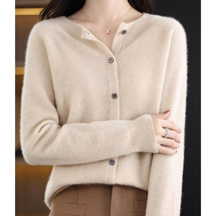 Comfortable women's elegant knit cardigan, an essential layering top for chic outfits.