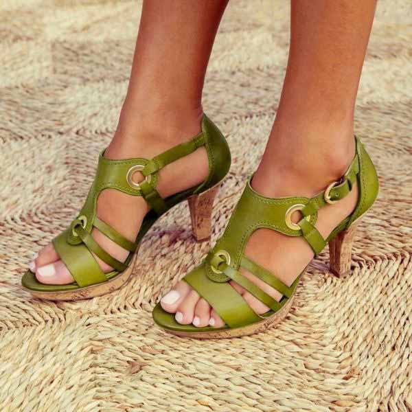 Modern women's open toe heeled sandals featuring a chic chunky heel, suitable for elegant daytime or evening outfits.