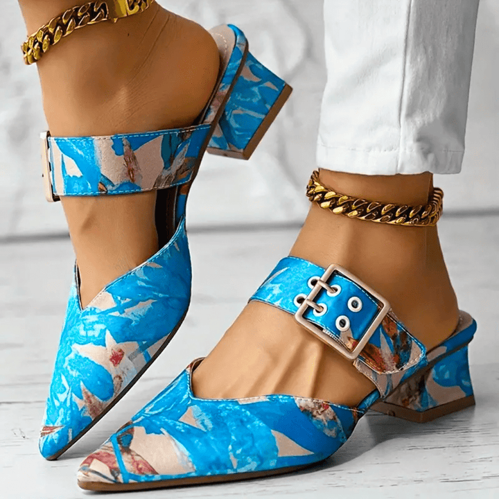 Vibrant women's statement heels. Colorful party shoes for a chic, fashion-forward look. Versatile occasion footwear.