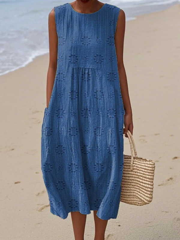 Women's sleeveless patterned midi dress. Versatile & elegant for casual wear, summer events, or a stylish brunch.