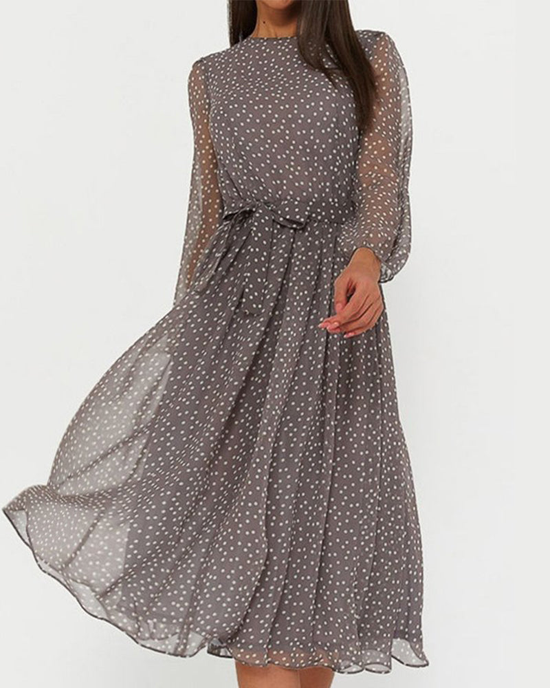 Elegant women's polka dot A-line dress, long sleeve, knee-length. Perfect for versatile casual or chic everyday wear.