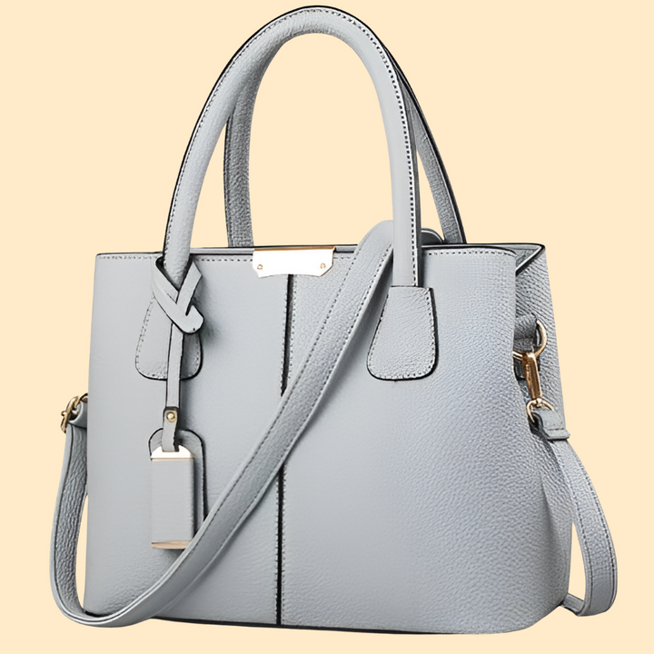 Premium quality solid color leather shoulder bag for women. A sophisticated and chic handbag for any occasion.