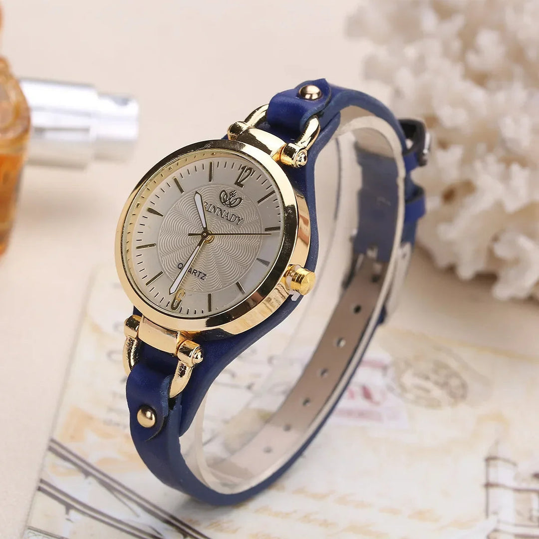 Slim classic ladies' quartz watch, minimalist design, with an engraved dial and vegan leather band.