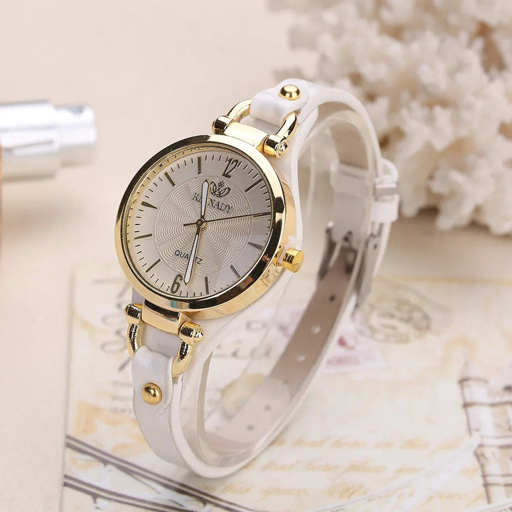 Classic women's timepiece, elegant engraved quartz watch with a soft, durable vegan leather strap.