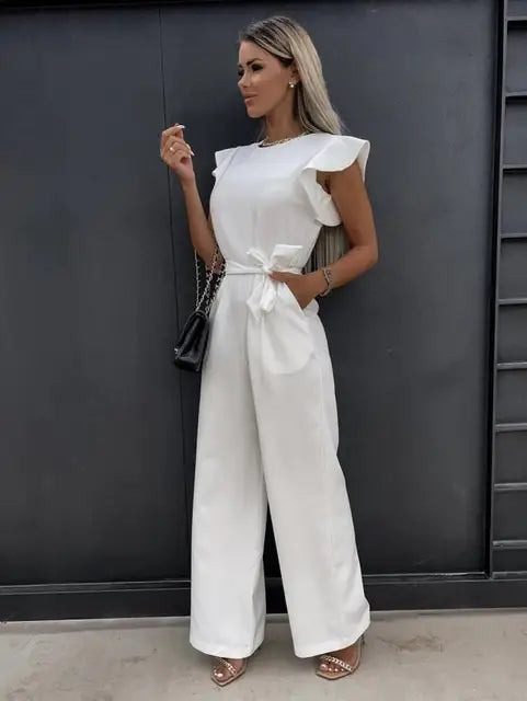 Stylish women's belted ruffle sleeve jumpsuit. Wide leg, flattering fit for summer fashion.