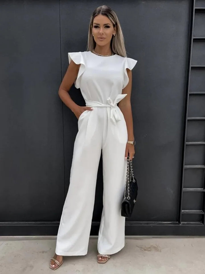 Full-length view of an elegant women's belted jumpsuit, featuring ruffle sleeves and a flattering wide leg.