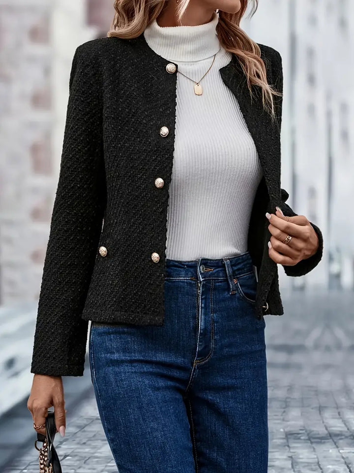 Chic women's single-breasted blazer. Versatile fashion jacket for elegant office attire or stylish casual outerwear.