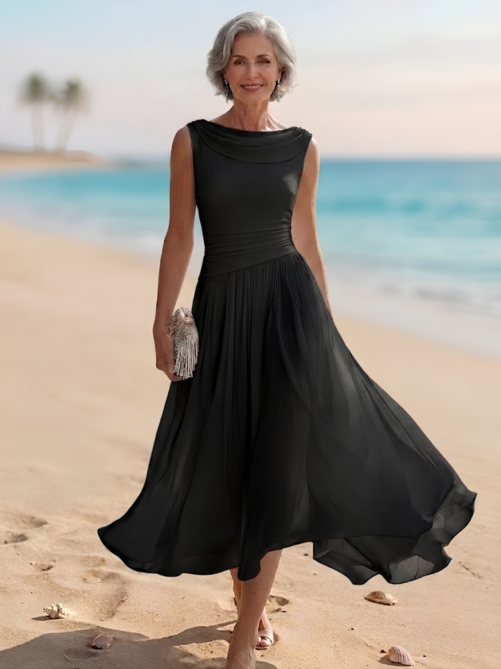 Women's formal draped neck midi dress with pleats. Stylish sleeveless A-line for spring/summer events.