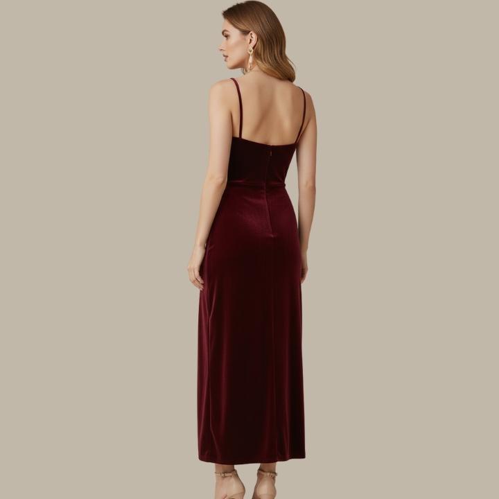 Black elegant women's cocktail dress, slim fit with a high split hem & thin spaghetti straps.