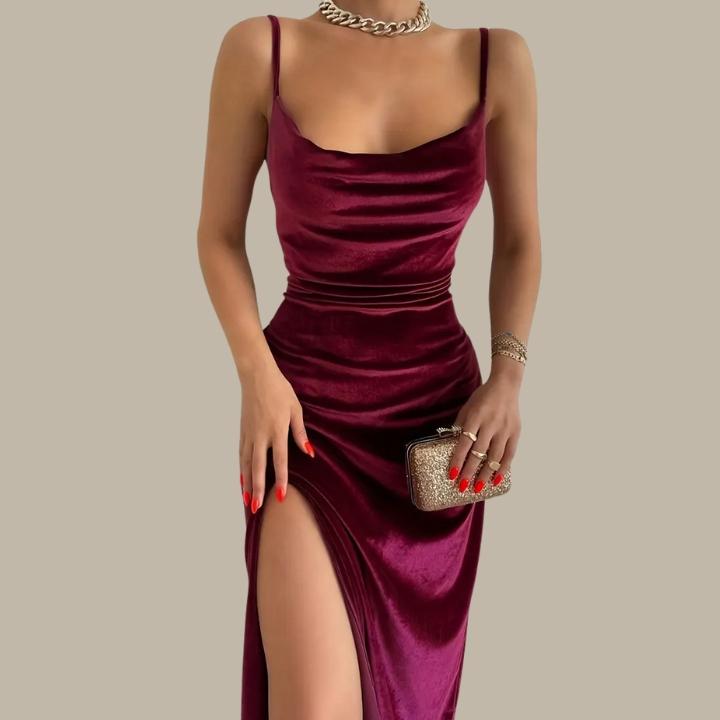 Chic women's party dress with an alluring split hem, bodycon silhouette, and delicate spaghetti straps.